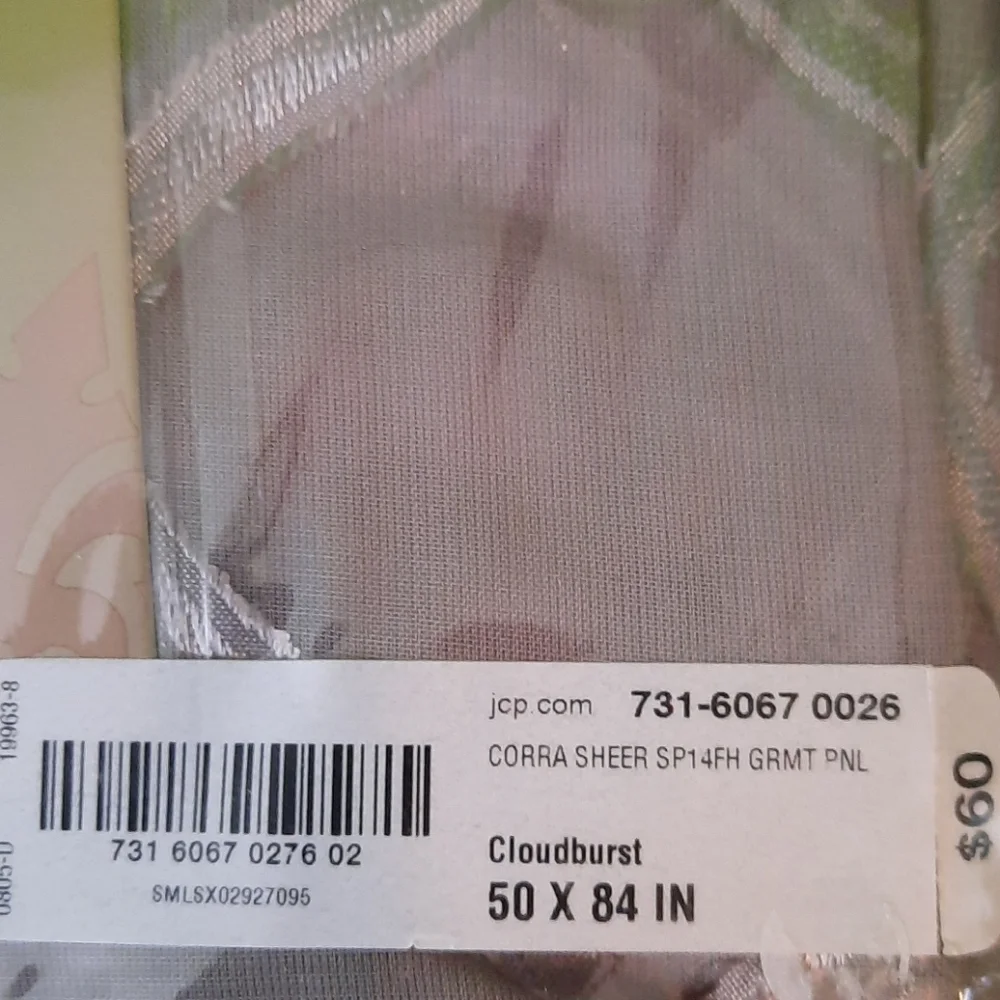 Sheer grommet panel window covering